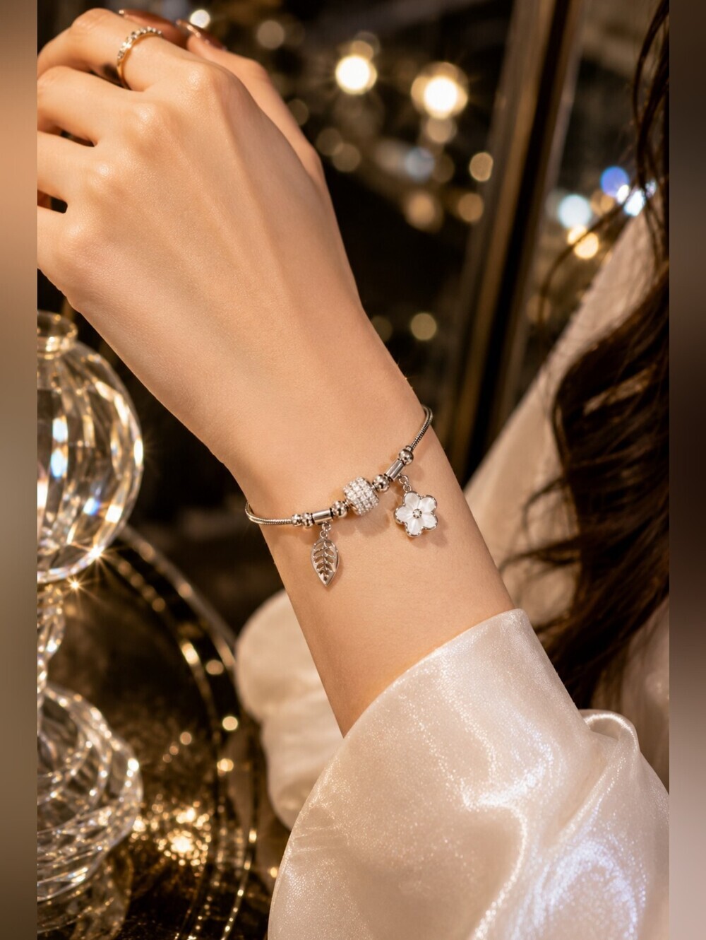 Silver Charm Bracelet with Crystal Bead, Flower & Leaf Charms | Adjustable Stain